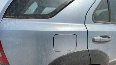 TAPA EXTERIOR COMBUSTIBLE