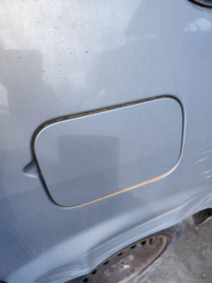 TAPA EXTERIOR COMBUSTIBLE