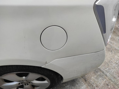 TAPA EXTERIOR COMBUSTIBLE