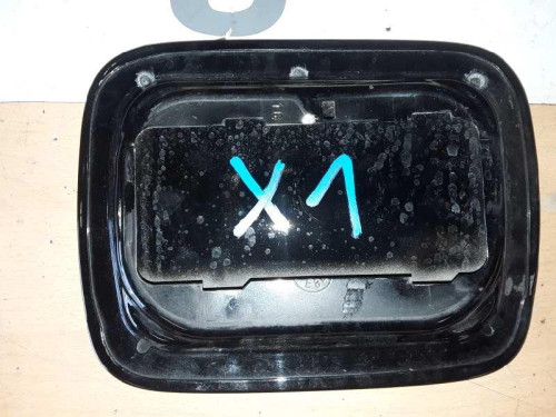 TAPA EXTERIOR COMBUSTIBLE 