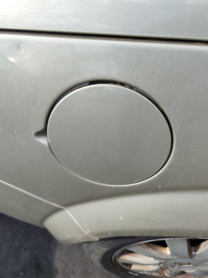 TAPA EXTERIOR COMBUSTIBLE