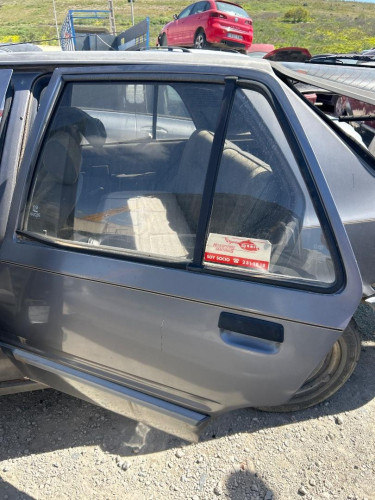 PUERTA TRASERA IZQUIERDA Peugeot 309 