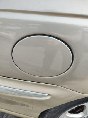 TAPA EXTERIOR COMBUSTIBLE