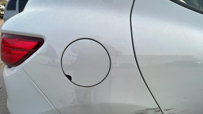 TAPA EXTERIOR COMBUSTIBLE