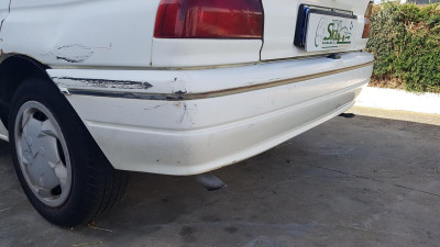 PARAGOLPES TRASERO Ford Escort Berlina (1986->)