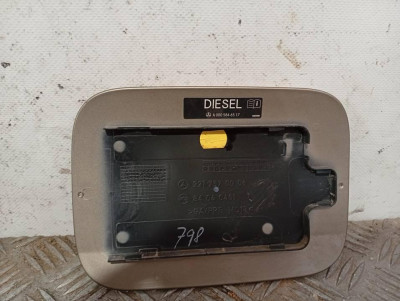 TAPA EXTERIOR COMBUSTIBLE