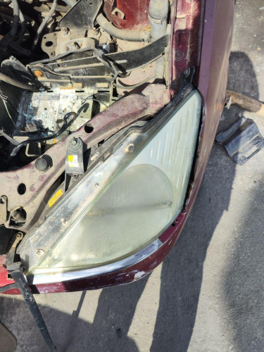 FARO IZQUIERDO Ford FOCUS BERLINA (CAK) 