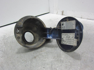 TAPA EXTERIOR COMBUSTIBLE