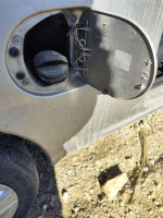TAPA EXTERIOR COMBUSTIBLE