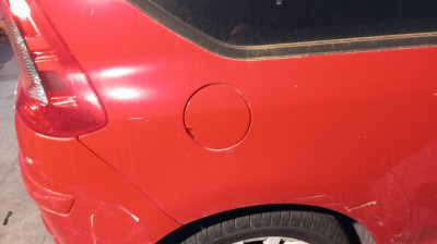 TAPA EXTERIOR COMBUSTIBLE