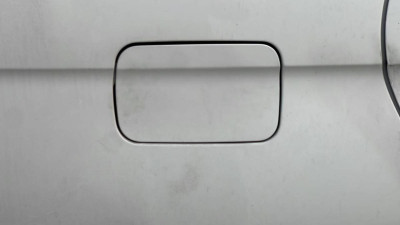 TAPA EXTERIOR COMBUSTIBLE