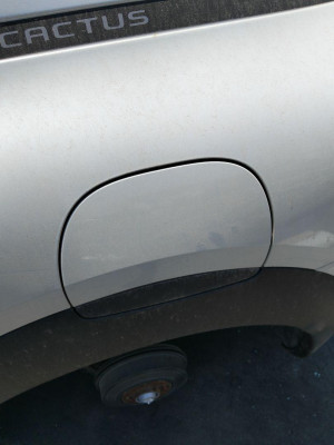 TAPA EXTERIOR COMBUSTIBLE
