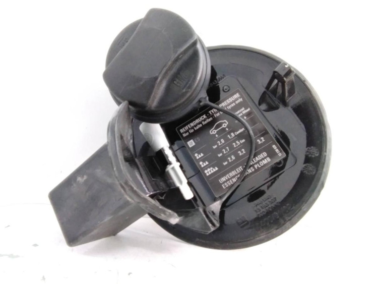 TAPA EXTERIOR COMBUSTIBLE