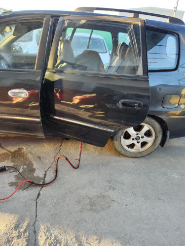  PUERTA TRASERA IZQUIERDA KIA CARENS (RS) 