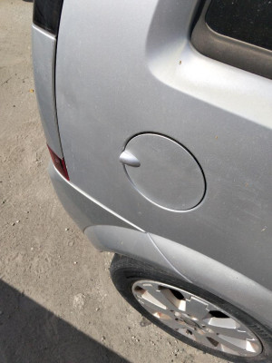 TAPA EXTERIOR COMBUSTIBLE