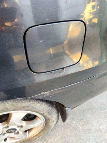  TAPA EXTERIOR COMBUSTIBLE KIA CARENS (RS) 