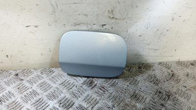 TAPA EXTERIOR COMBUSTIBLE