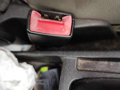 PRETENSOR AIRBAG IZQUIERDO