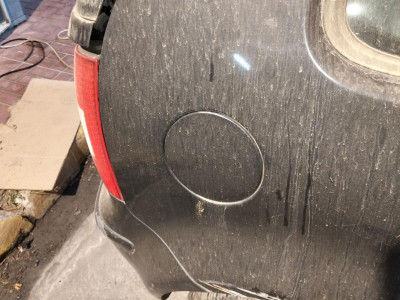 TAPA EXTERIOR COMBUSTIBLE