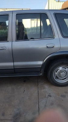 PUERTA TRASERA IZQUIERDA Kia Sportage (1994->)