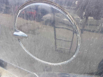 TAPA EXTERIOR COMBUSTIBLE