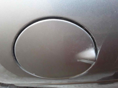 TAPA EXTERIOR COMBUSTIBLE