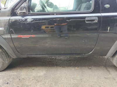 PUERTA DELANTERA IZQUIERDA