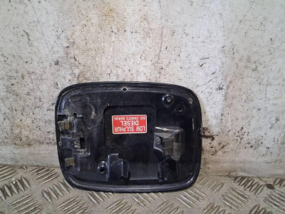 TAPA EXTERIOR COMBUSTIBLE
