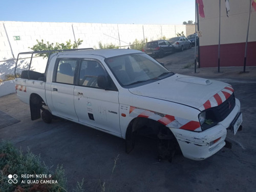 Mitsubishi L200 (K70)(1996->) — автомобиль-донор на запчасти 