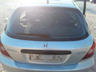 PORTON TRASERO