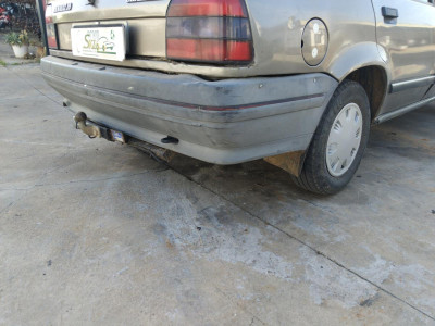 PARAGOLPES TRASERO Renault R 19 Berl. con portón (B/C53)(1988->)