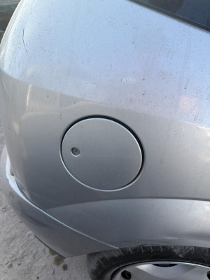 TAPA EXTERIOR COMBUSTIBLE