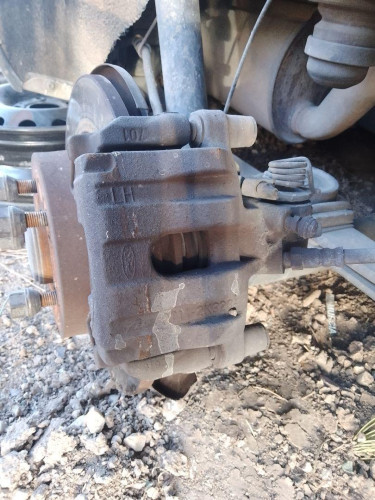 PINZA DE FRENO TRASERA IZQUIERDA Ford TRANSIT CONNECT (TC7) 