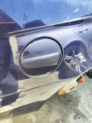 TAPA EXTERIOR COMBUSTIBLE