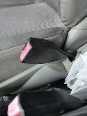 PRETENSOR AIRBAG DERECHO