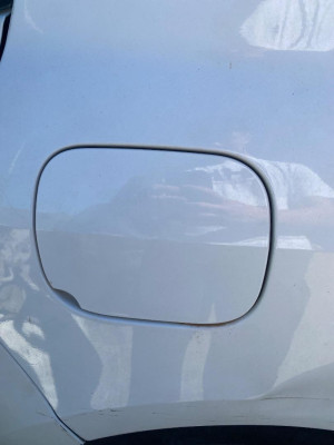 TAPA EXTERIOR COMBUSTIBLE