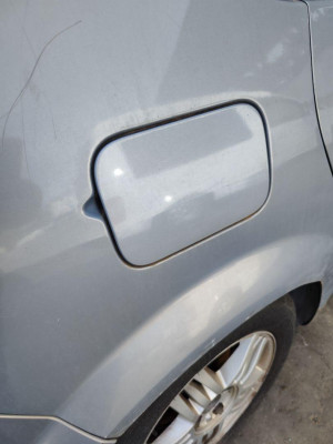 TAPA EXTERIOR COMBUSTIBLE