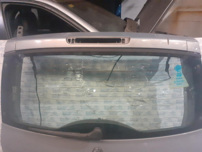 PORTON TRASERO