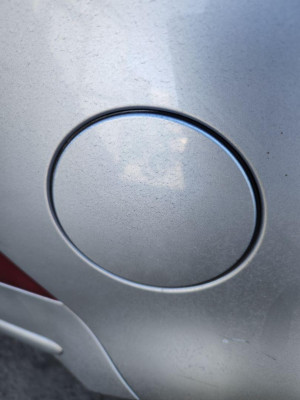 TAPA EXTERIOR COMBUSTIBLE