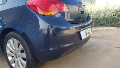 PARAGOLPES TRASERO Opel Astra J Berlina 5p (12.2009->)