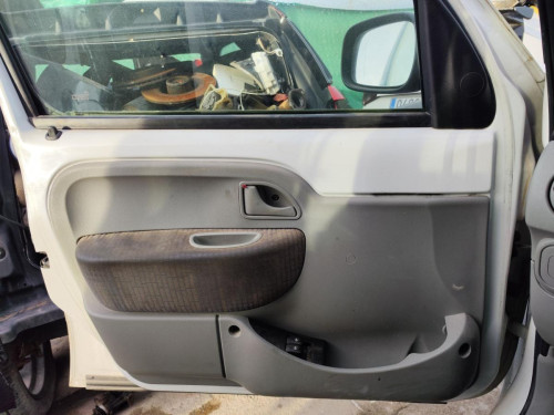 GUARNECIDO PUERTA DELANTERA IZQUIERDA de segunda mano