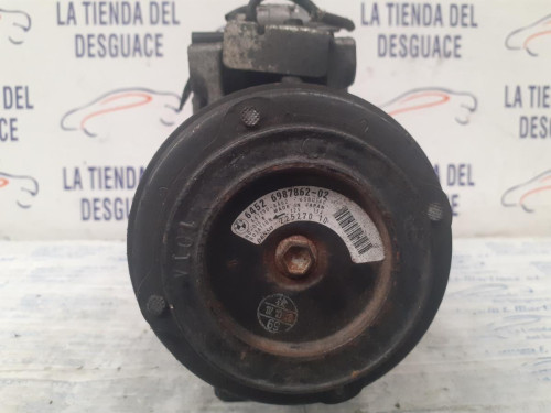  COMPRESOR AIRE ACONDICIONADO 