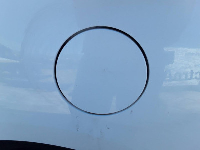 TAPA EXTERIOR COMBUSTIBLE