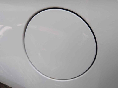 TAPA EXTERIOR COMBUSTIBLE