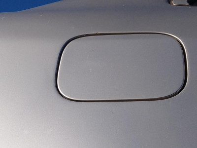 TAPA EXTERIOR COMBUSTIBLE