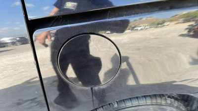 TAPA EXTERIOR COMBUSTIBLE