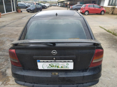 TAPA MALETERO Opel Astra G Coupe (2000->)