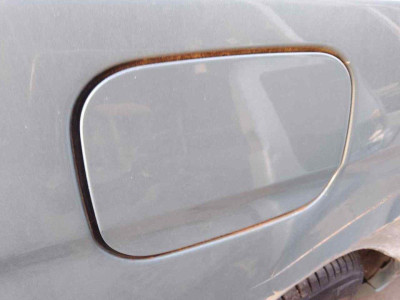 TAPA EXTERIOR COMBUSTIBLE