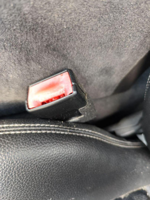 PRETENSOR AIRBAG IZQUIERDO