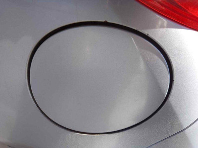 TAPA EXTERIOR COMBUSTIBLE
